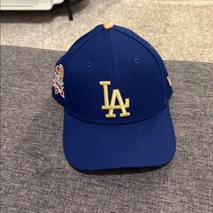 LA Dodgers 2024 World Series Champions gold Dodgers hat.